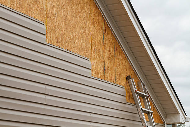 Professional Emergency Siding Repair technician working in Boston, MA